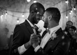 Newlywed Gay Couple Dancing on Wedding Celebration