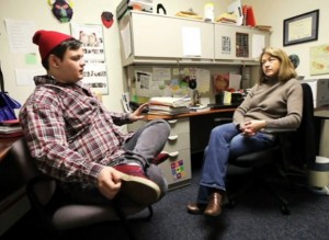 Dalton Wooten meets with social worker Susan Hewitt. Screenshot courtesy of the Courier-Journal.