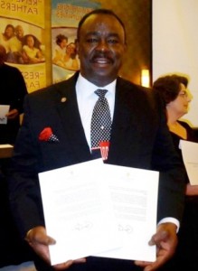 Halbert Sullivan shows congratulatory letters he received from President Obama.Photo courtesy of the St. Louis Post Dispatch.