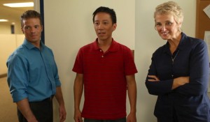 In “The Commitment” Mary Niederkorn (right) portrays a social worker named Susan who helps a gay couple named Robert (Albert M. Chan) (center) and Ethan (Jason Lane Fenton) try to adopt an infant. Photo courtesy of Albert M. Chan.