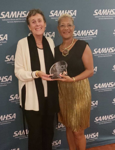Past NASW President Suzanne Dworak-Peck and awardee Rozell Green